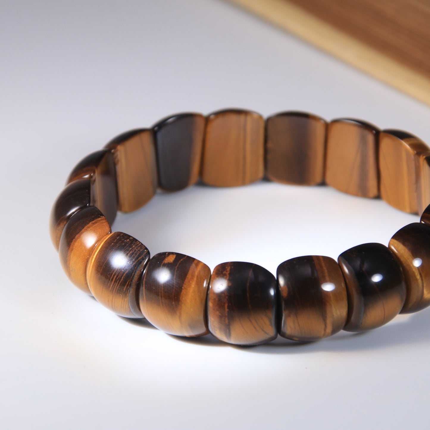 Tiger's eye half-moon bead